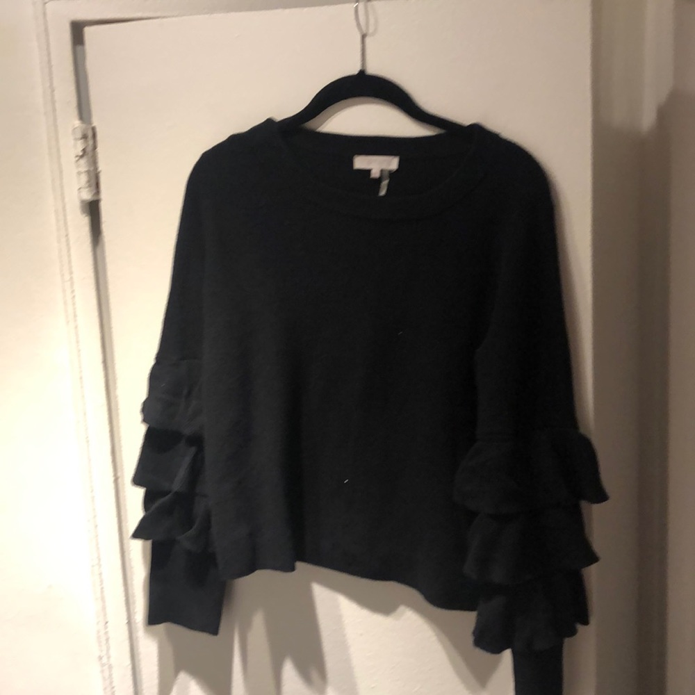 Sweater with ruffled sleeves